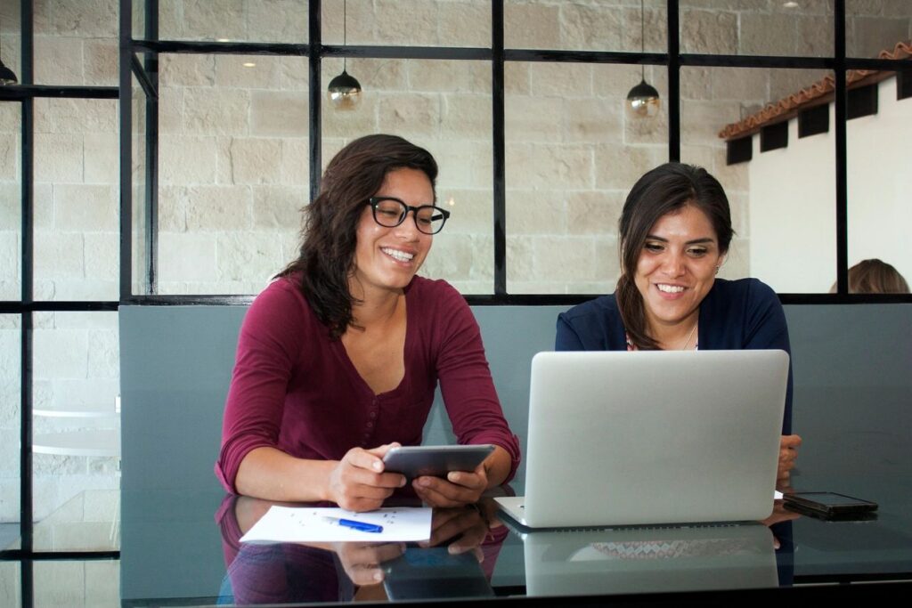 Writer analyzing digital media strategy on laptop